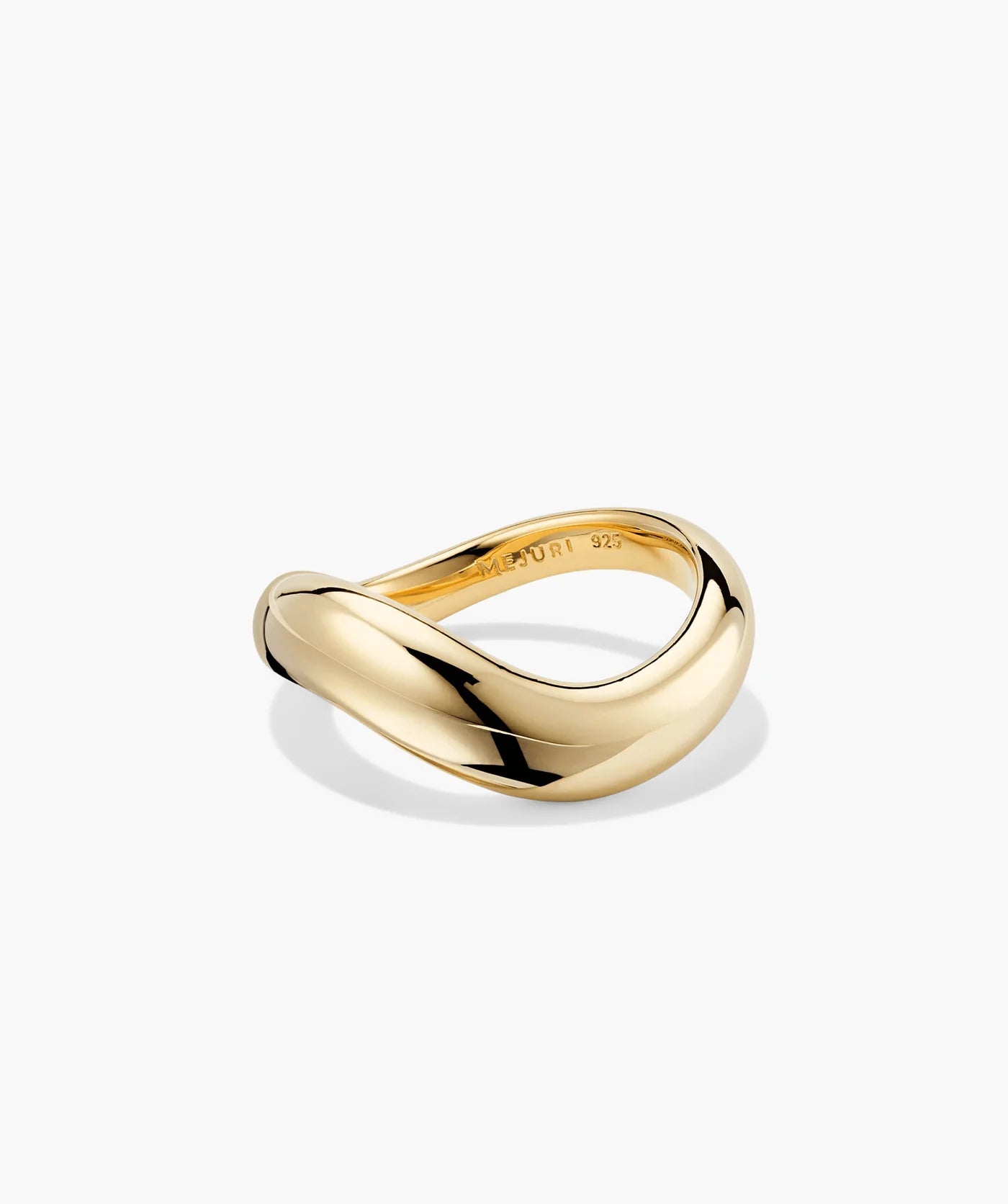 Sculptural gold-tone open-curve statement ring, angled view