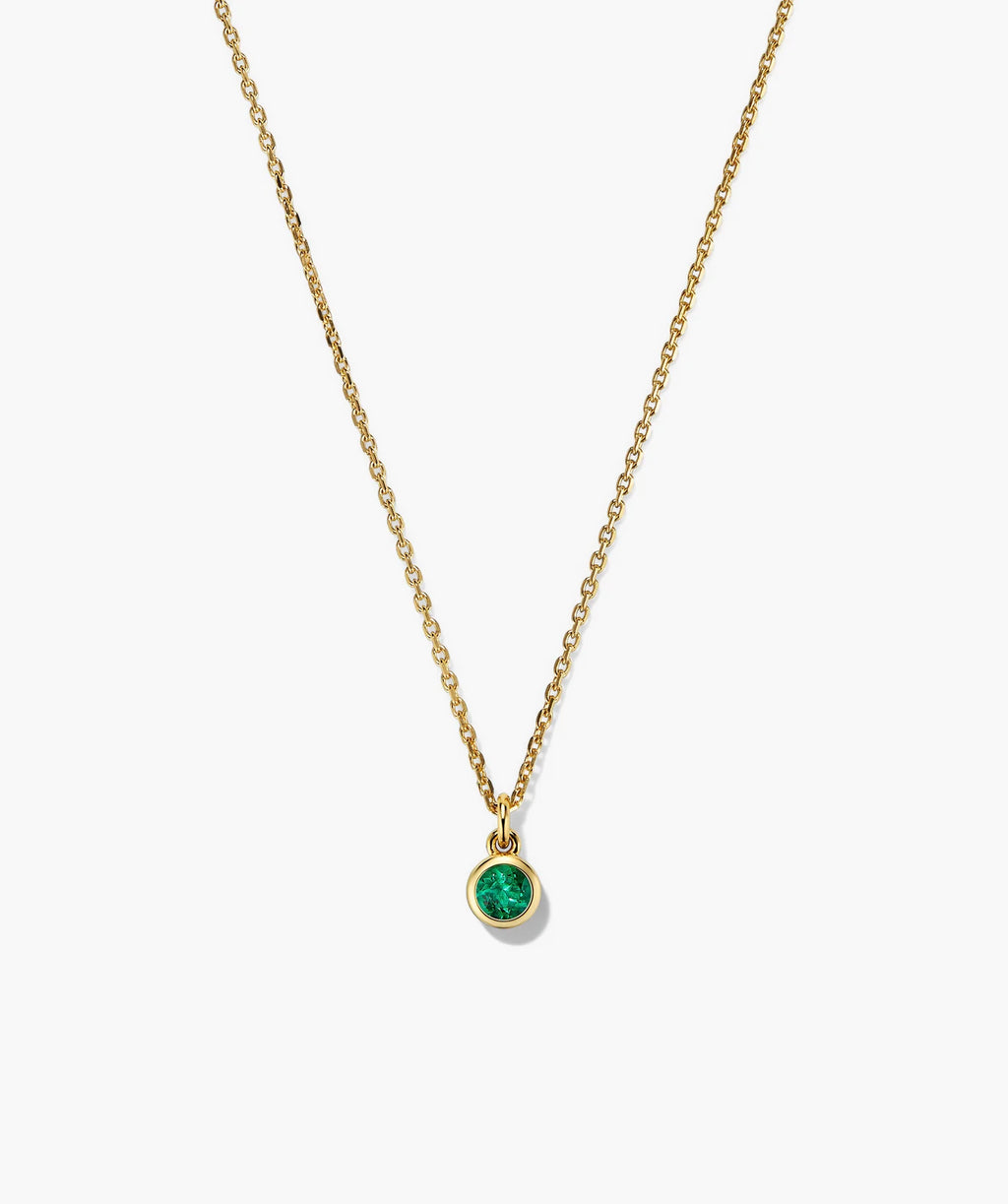 Fine gold-tone necklace with a round green stone pendant