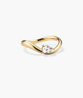 Gold-tone open ring with a floating pear-cut clear stone