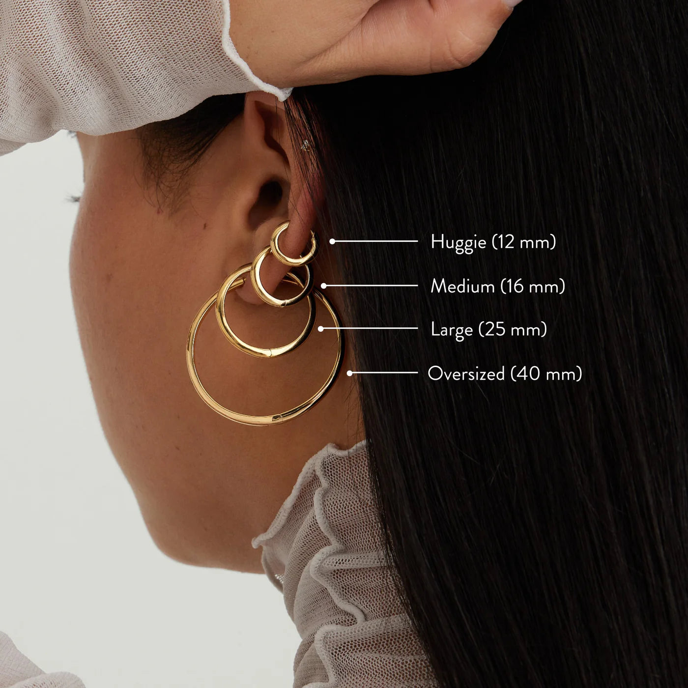Tube huggie hoops with 12 mm diameter measurements marked